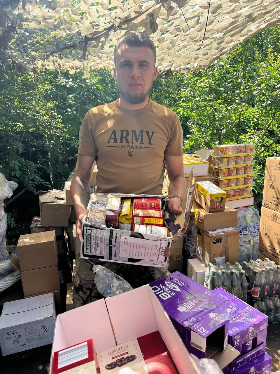 Soldier receiving aid from UK